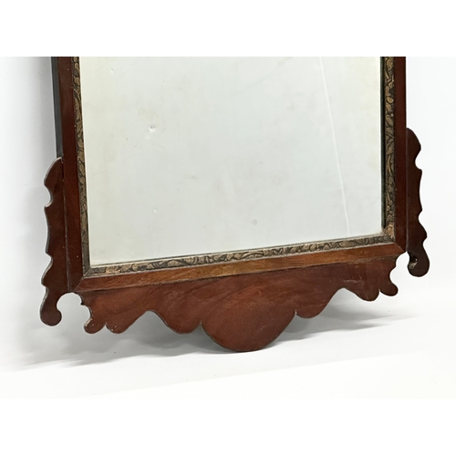 355 - A Late 19th Century, Georgian style mahogany framed mirror. 39x61cm