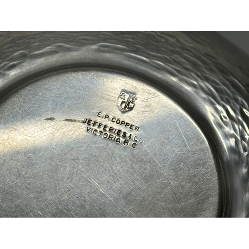 176 - Jefferies & Co. A Victorian B.C hammered silver on copper bowl, with embossed flower motif. 15cm.