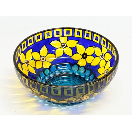 57 - A decorative glass bowl. With makers mark. 17x7cm