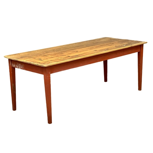 358 - A large Early 20th Century Shakers style pine farmhouse kitchen table. 203x86x77cm. 10