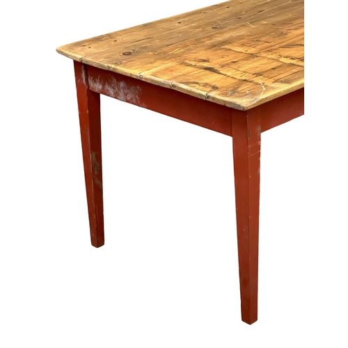 358 - A large Early 20th Century Shakers style pine farmhouse kitchen table. 203x86x77cm. 10