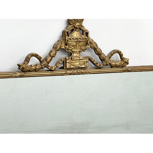 226 - An Early/Mid 20th Century gilt framed mirror. In the 18th Century style. 81x76cm