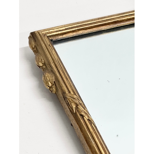 226 - An Early/Mid 20th Century gilt framed mirror. In the 18th Century style. 81x76cm