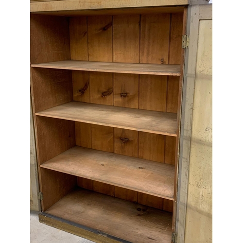 382E - A large Victorian pine 2 door cupboard with original scumble finish and fitted shelves. Circa 1870. ... 