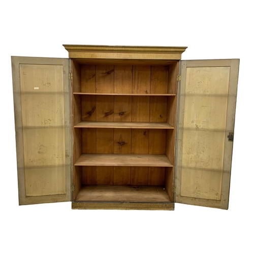 382E - A large Victorian pine 2 door cupboard with original scumble finish and fitted shelves. Circa 1870. ... 