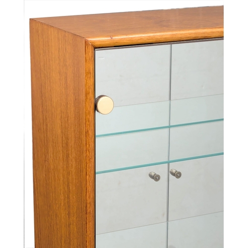 123 - A Mid Century teak display cabinet by Turnidge of London. With drawer and fitted glass shelves. 91.5... 