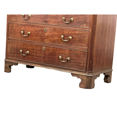 13 - An 18th Century, George III mahogany chest of drawers. With dental cornice, reeded canted corners, o... 