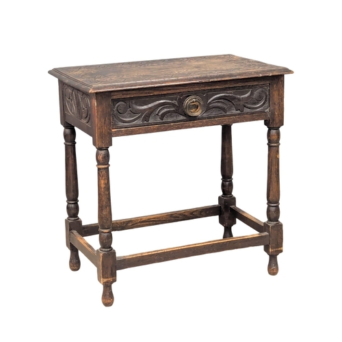 147 - A Late 19th Century Victorian carved oak side table on turned supports with drawer. Circa 1890/1900.... 