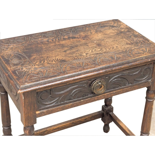 147 - A Late 19th Century Victorian carved oak side table on turned supports with drawer. Circa 1890/1900.... 