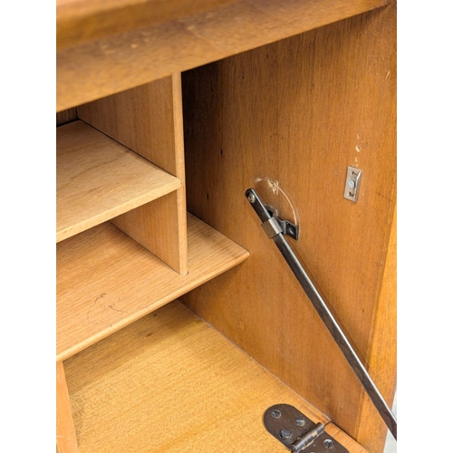 159 - A Mid Century teak bureau bookcase by Herbert Gibbs. 91.5x27.5x112.5cm. 2