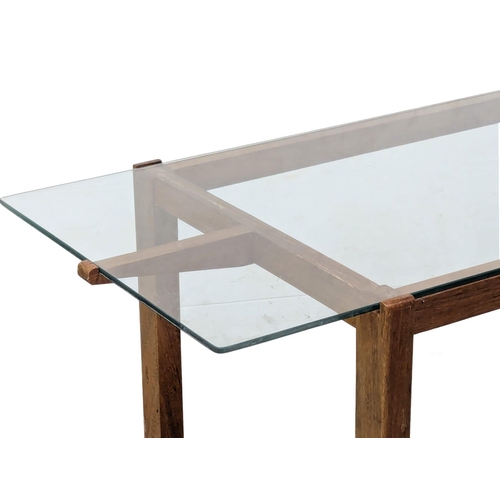 162A - A Mid Century glass top coffee table with teak base. 94x43x51cm. 3