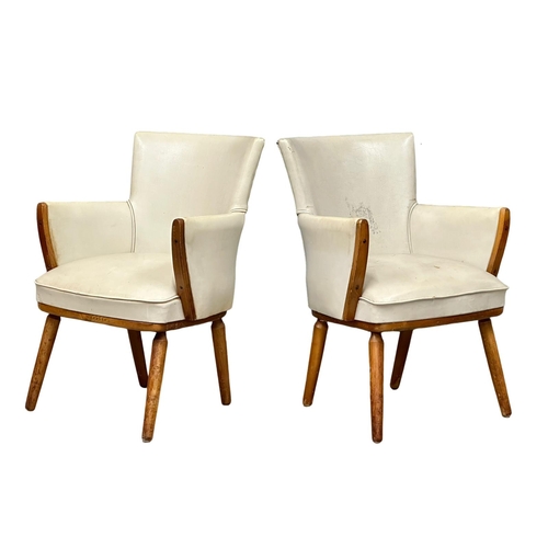 163 - A pair of Mid Century armchairs. 2