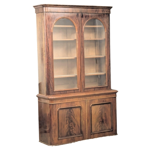 197 - A large 19th Century Victorian mahogany double glazed door bookcase with adjustable shelves. 146x50x... 