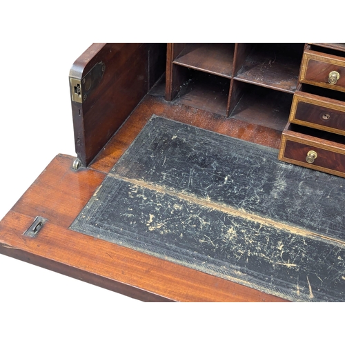 198 - An Early 19th Century George IV inlaid mahogany secretaire writing table. 99x63x82cm. 1