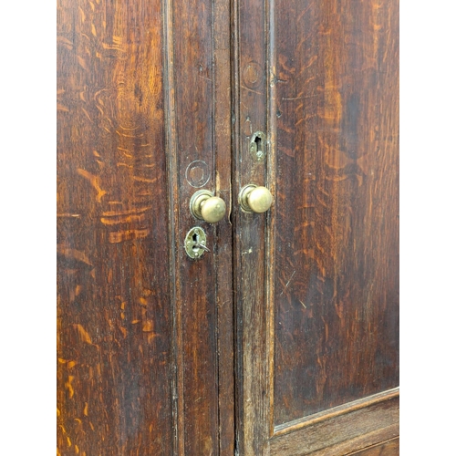 2 - A Late 18th Century George III oak press with original brass drop handles. Circa 1770-1780. 117x58x2... 