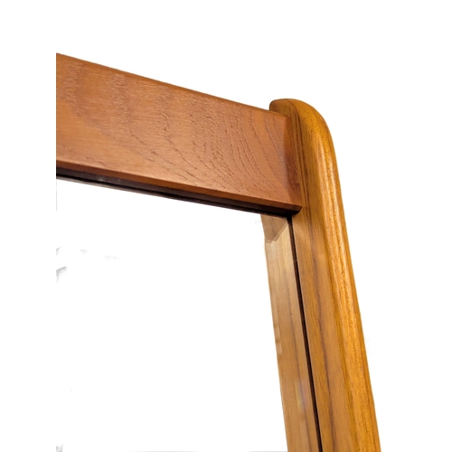 21 - Pedersen & Hansen. A Danish Mid Century teak mirror designed by Pedersen & Hansen. 40x106cm