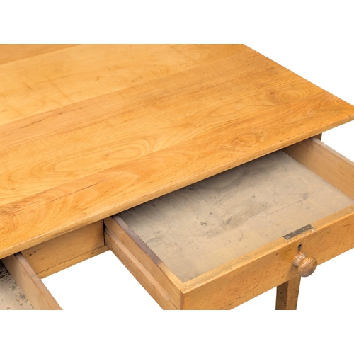 224 - A 1950s beech kitchen table with 2 drawers on square tapering legs. 137x77x76cm. 2