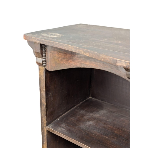 228 - An Early 20th Century Arts & Crafts bureau bookcase. Circa 1900-1910. 69x33x147cm. 1