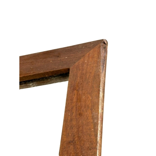 252 - A 1960’s Danish Mid Century teak framed mirror. 33.5x75cm.