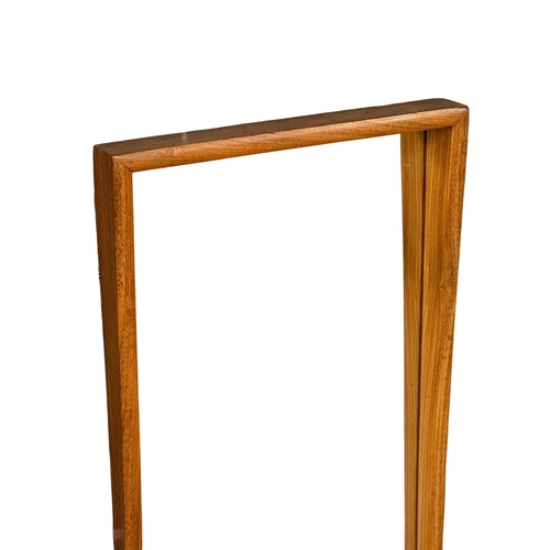 253 - A 1960’s Mid Century teak framed mirror. 33x94cm