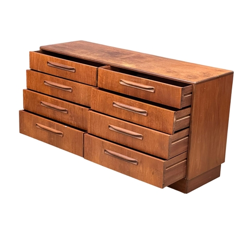 256 - A large GPlan Fresco Mid Century teak chest of drawers. Designed by Victor Wilkins. 142x44.5x76cm. 3