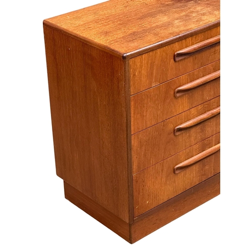 256 - A large GPlan Fresco Mid Century teak chest of drawers. Designed by Victor Wilkins. 142x44.5x76cm. 3