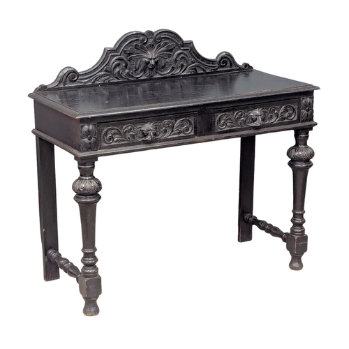 271 - A Late 19th Century Victorian carved oak hall table with Man Of The Forest carvings and 2 drawers. C... 