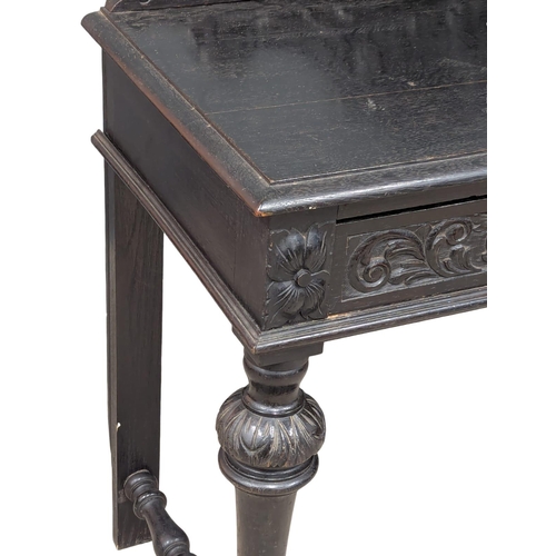 271 - A Late 19th Century Victorian carved oak hall table with Man Of The Forest carvings and 2 drawers. C... 