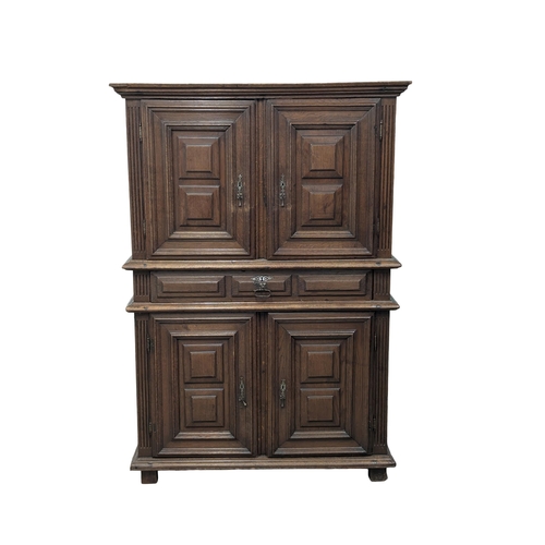 275 - A large late 17th/Early 18th century North European 2 piece oak court cupboard with geometric handle... 