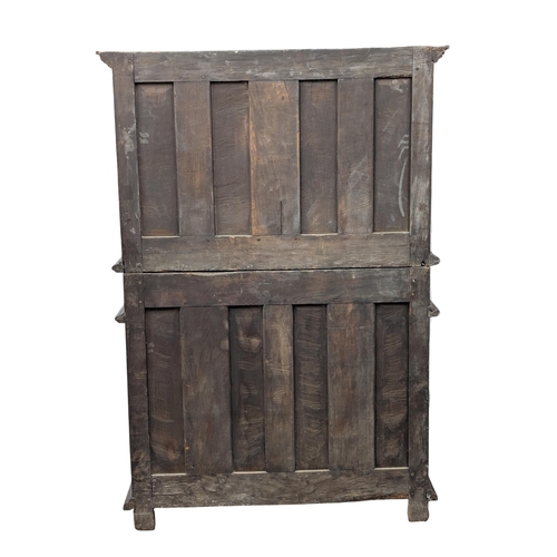 275 - A large late 17th/Early 18th century North European 2 piece oak court cupboard with geometric handle... 