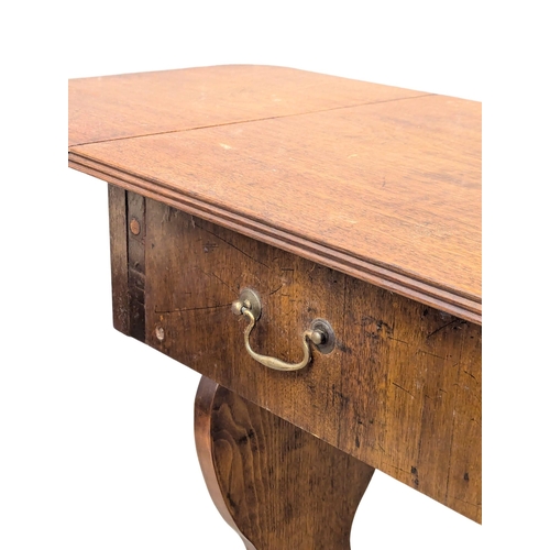 287 - A Late 19th Century North European walnut sofa table on stretcher base. With 1 drawer and dummy draw... 