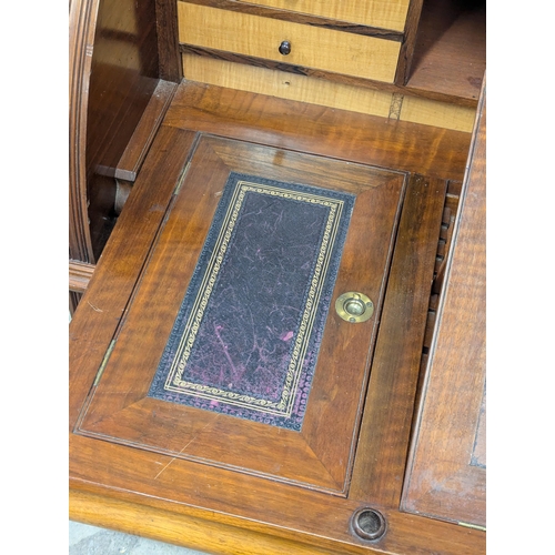 29 - A large 19th century Victorian walnut cylinder top desk. With Birdseye maple interior drawers. 137cm... 