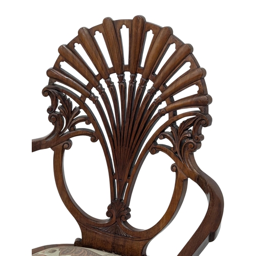 319 - An Edwardian period fan back mahogany armchair on cabriole legs in the 18th century style. 1