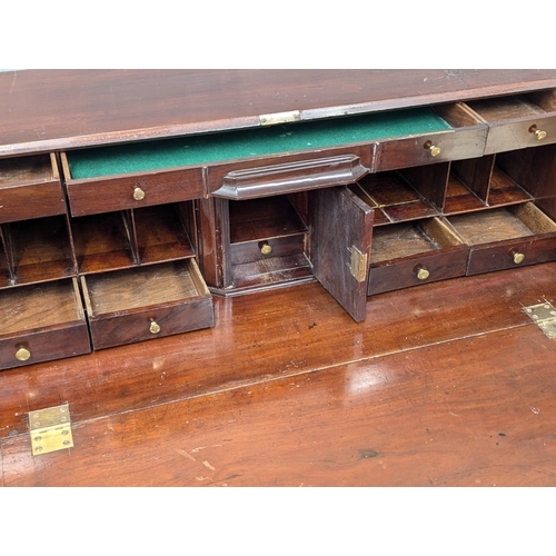 331 - An Early 19th Century George III mahogany bureau bookcase. Circa 1800.  107x53x222cm. 1