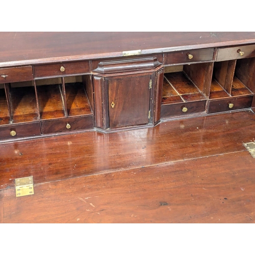 331 - An Early 19th Century George III mahogany bureau bookcase. Circa 1800.  107x53x222cm. 1