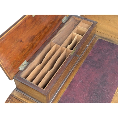 352 - An Edwardian inlaid mahogany dropleaf writing table with leather top and brass gallery. 107x47x86cm ... 