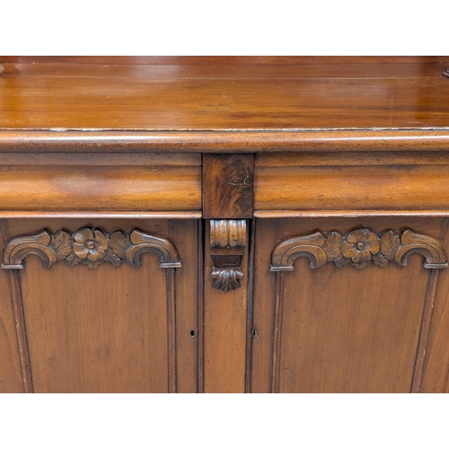 370 - A 19th Century Victorian mahogany chiffonier with bobbin turn supports. Circa 1870. 124x54x178cm. 2