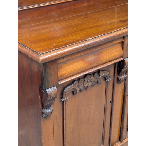 370 - A 19th Century Victorian mahogany chiffonier with bobbin turn supports. Circa 1870. 124x54x178cm. 2