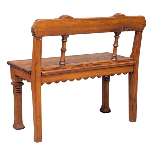 46 - A small proportioned 19th Century Victorian pitch pine hall bench in the gothic style. Circa 1880. 8... 