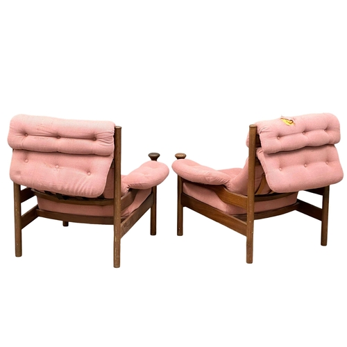 50 - A pair of 1960’s Mid Century teak “Sante Fe” armchairs, designed by Eric Pamphilon and George Fejer ... 