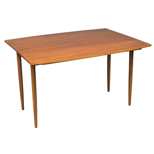 8 - A Mid Century teak extending dining table with 4 chairs by Greaves & Thomas. Extended 98x124x74cm. 3