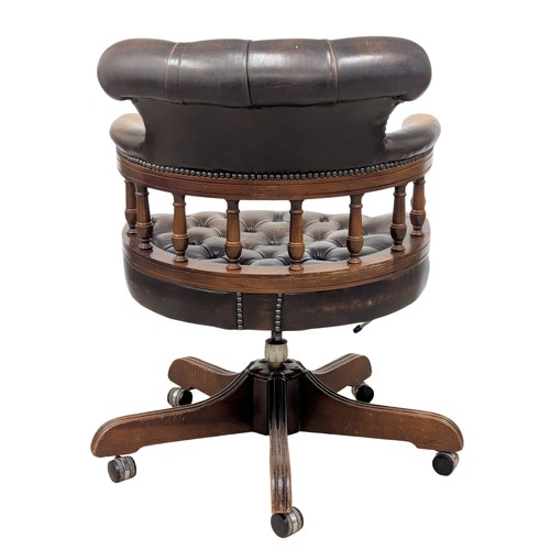 146 - A deep button back leather swivel desk chair. 2