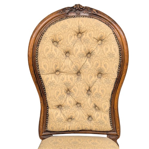 306 - A 19th Century Victorian walnut spoon back nursing chair on Cabriole legs. Circa 1860/1870. 2