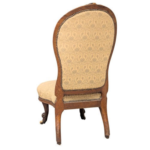 306 - A 19th Century Victorian walnut spoon back nursing chair on Cabriole legs. Circa 1860/1870. 2