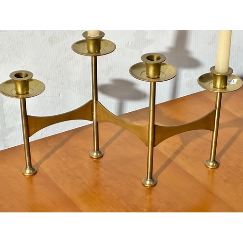 12 - A brass centrepiece candleholder. 41x24cm
