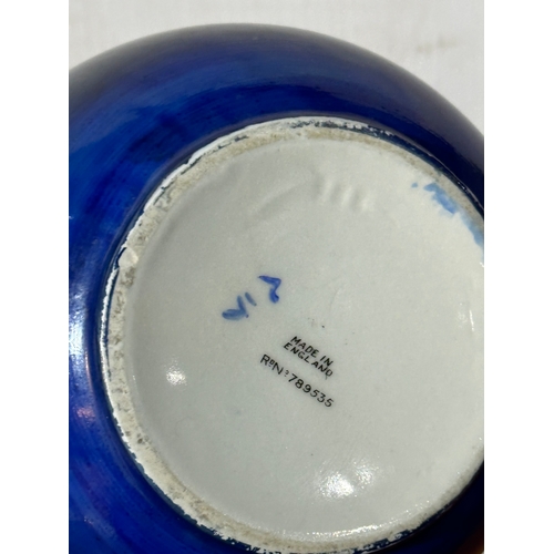 17 - A 1930’s Carlton Ware “Rowntrees cocoa” jug. 15x13x20cm