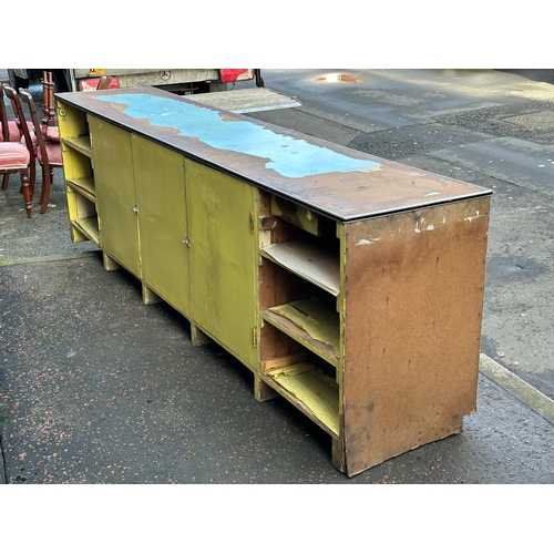 15 - A very large vintage shops counter. With glass front and cupboard doors. 305x61x92cm