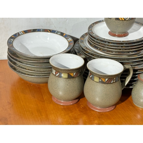 27 - A Denby Marrakesh part dinner service/ tea service. 6 dinner plates, 7 tea cups/coffee cups. 2 milk ... 