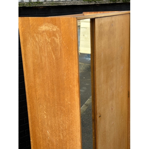 29 - A Mid Century “C Range” wardrobe, designed by John & Sylvia Reid for Stag. 91x55.5x182cm