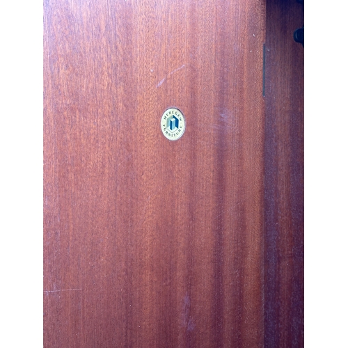 7 - A Mid Century wardrobe by Meredew. 91x56x185cm